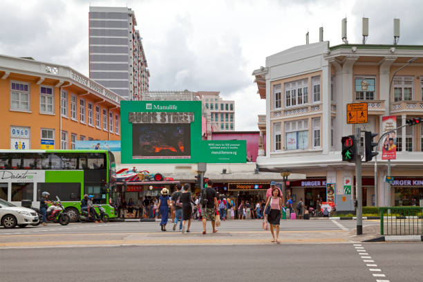 Vibrant scene of Bugis Street Market, one of Singapore’s largest street markets, showcasing a bustling atmosphere with shops selling fashion, accessories, and local food.