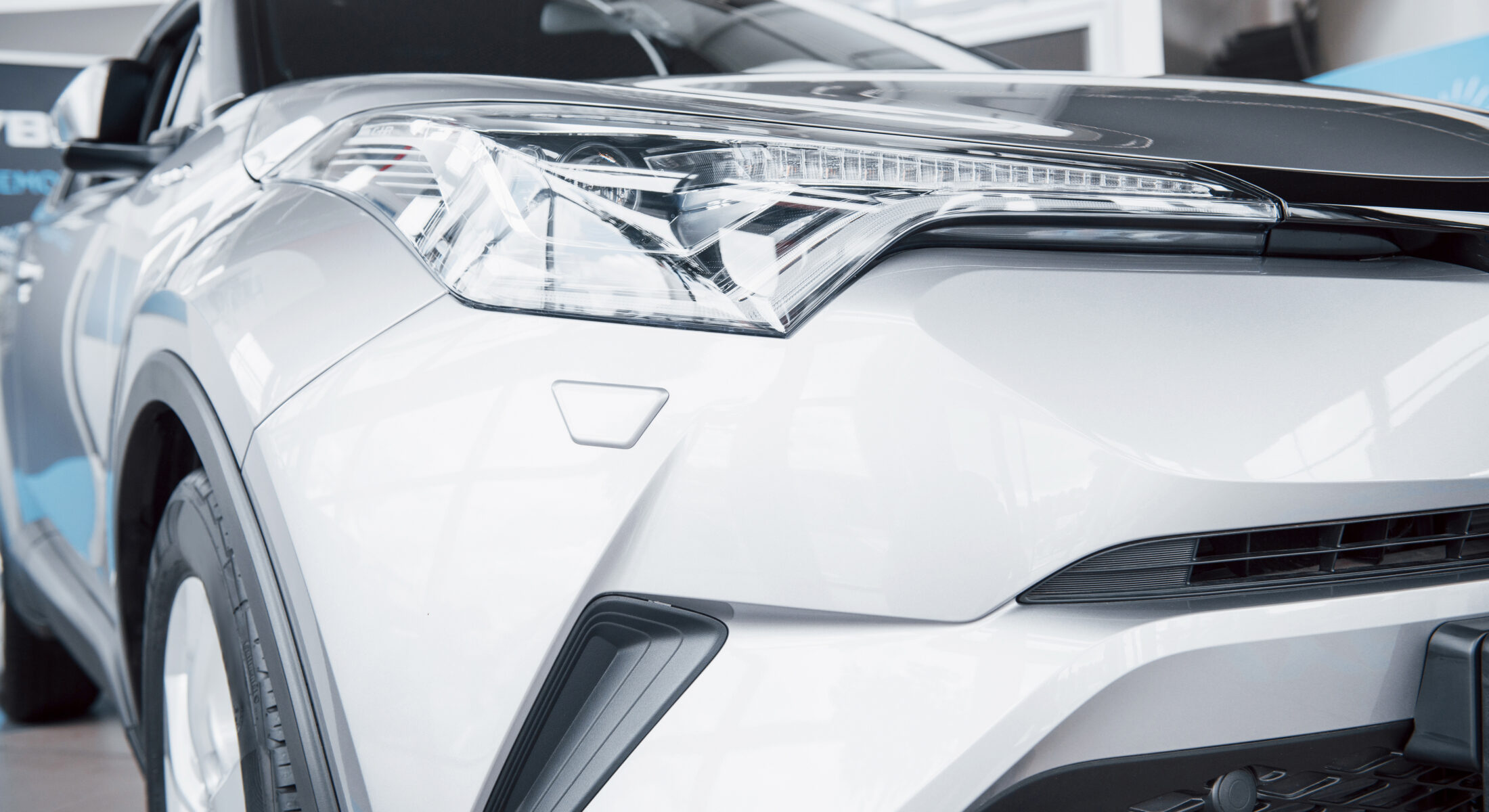 Close-up of a modern car headlamp and front grille showcased at Singapore Motorshow 2026 at Suntec Singapore Convention & Exhibition Centre