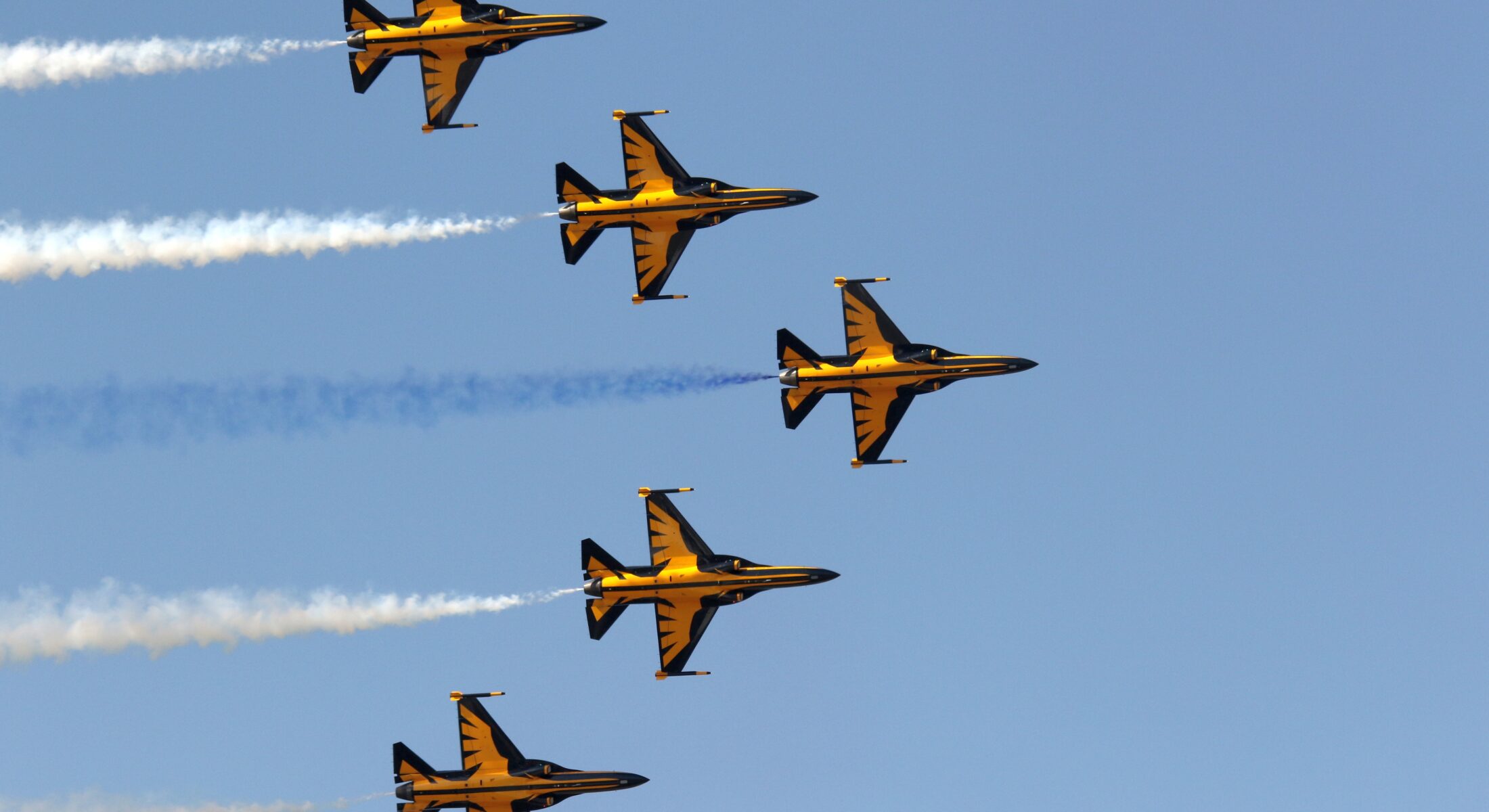Aerobatic jets performing a formation display at Singapore Airshow 2026 at Changi Exhibition Centre