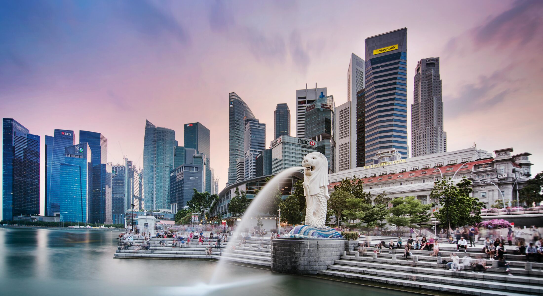 Merlion Park at Marina Bay with Singapore skyline during IVF Waka Ama World Sprints 2026, featuring the Merlion statue and CBD.
